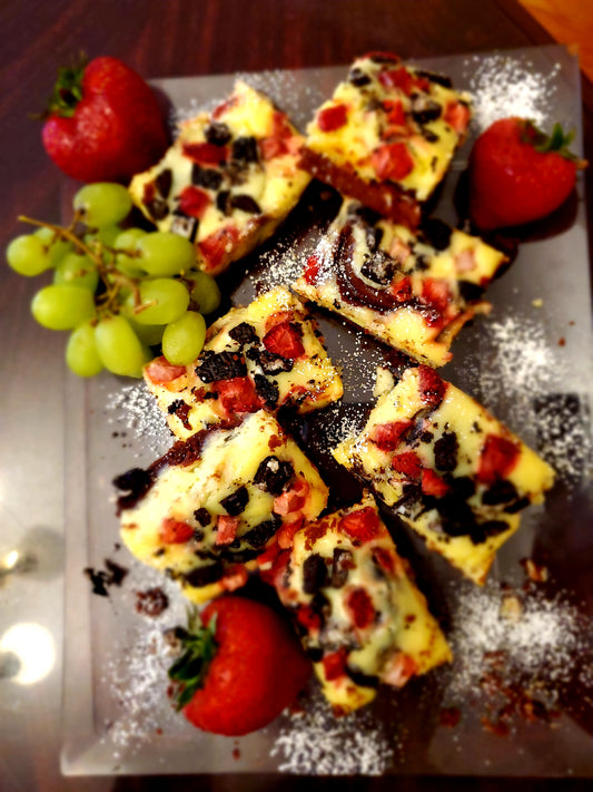 Cheesecake Brownies with OREO Cookies and Strawberries